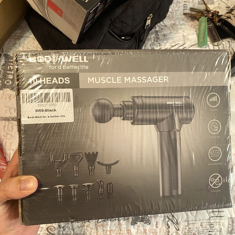 Massage gun color black brand new! Still in protective bag